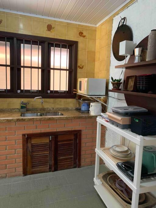 Casa 6 quartos, 3 suítes 4 banheiros