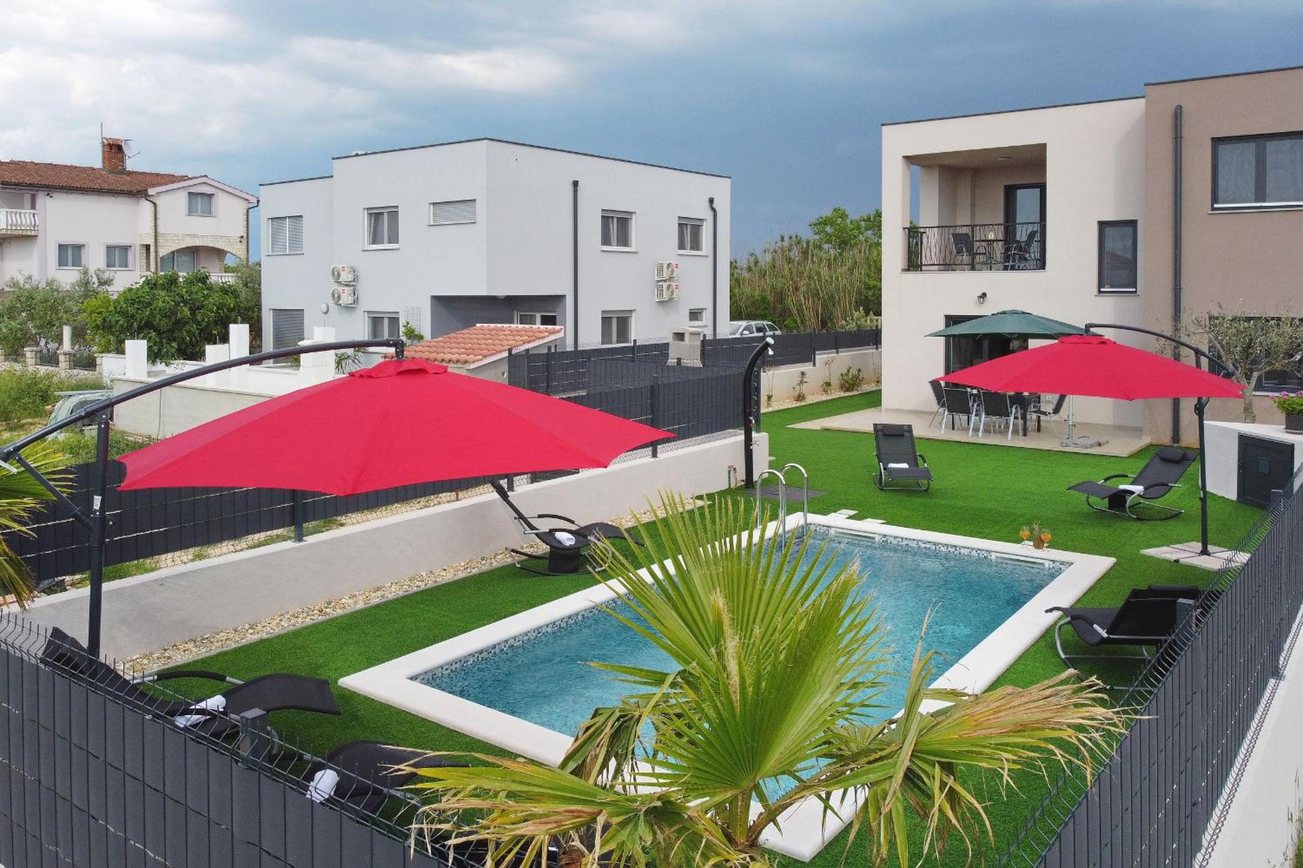 Villa Tri Palme with heated pool
