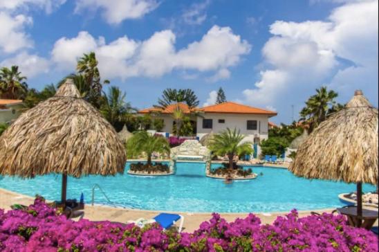 Kas di BaMi A-194 op Seru Coral Resort - Ruim appartement met groot zwembad en tropische tuin
