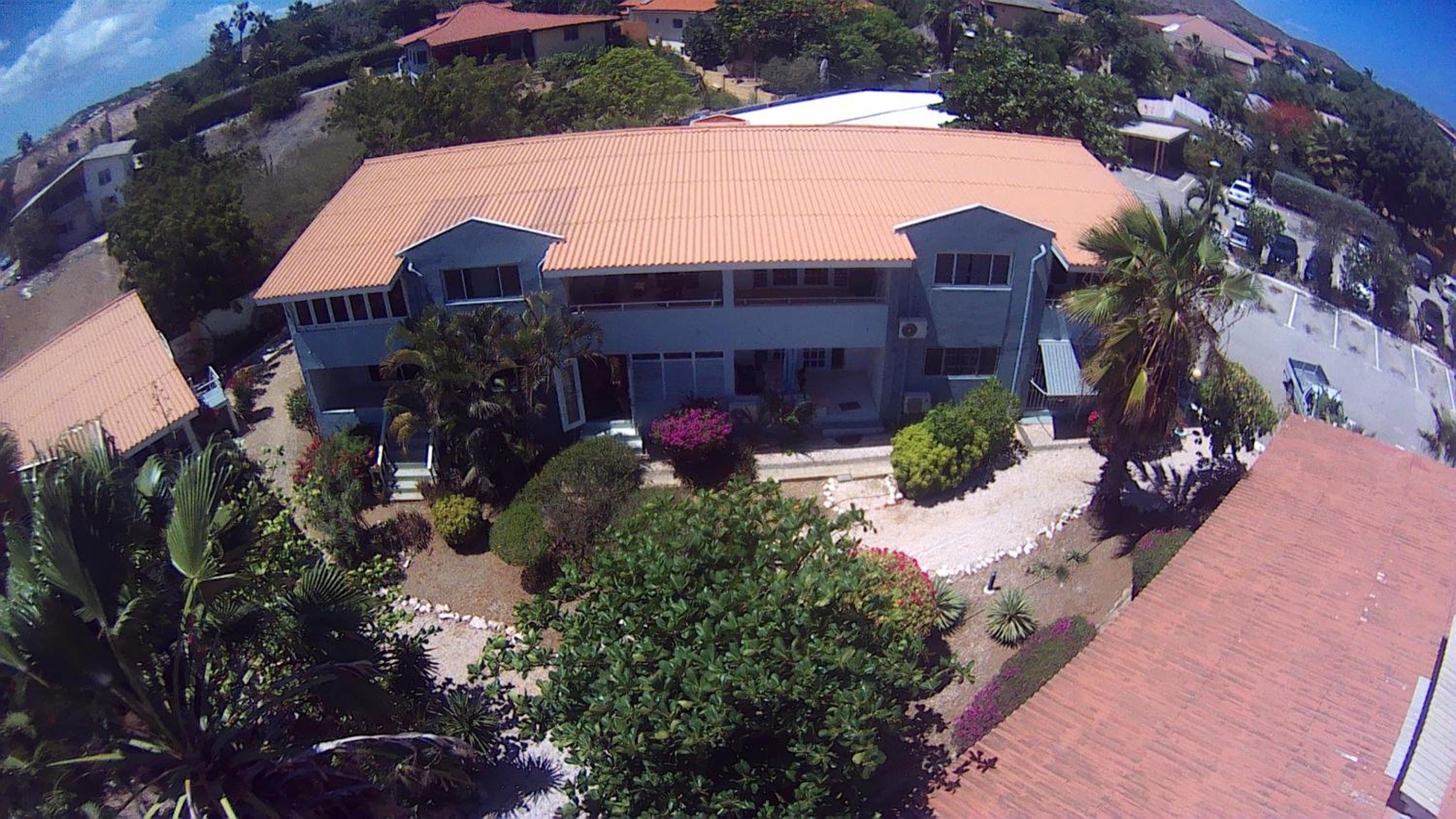 Kas di BaMi A-194 op Seru Coral Resort - Ruim appartement met groot zwembad en tropische tuin