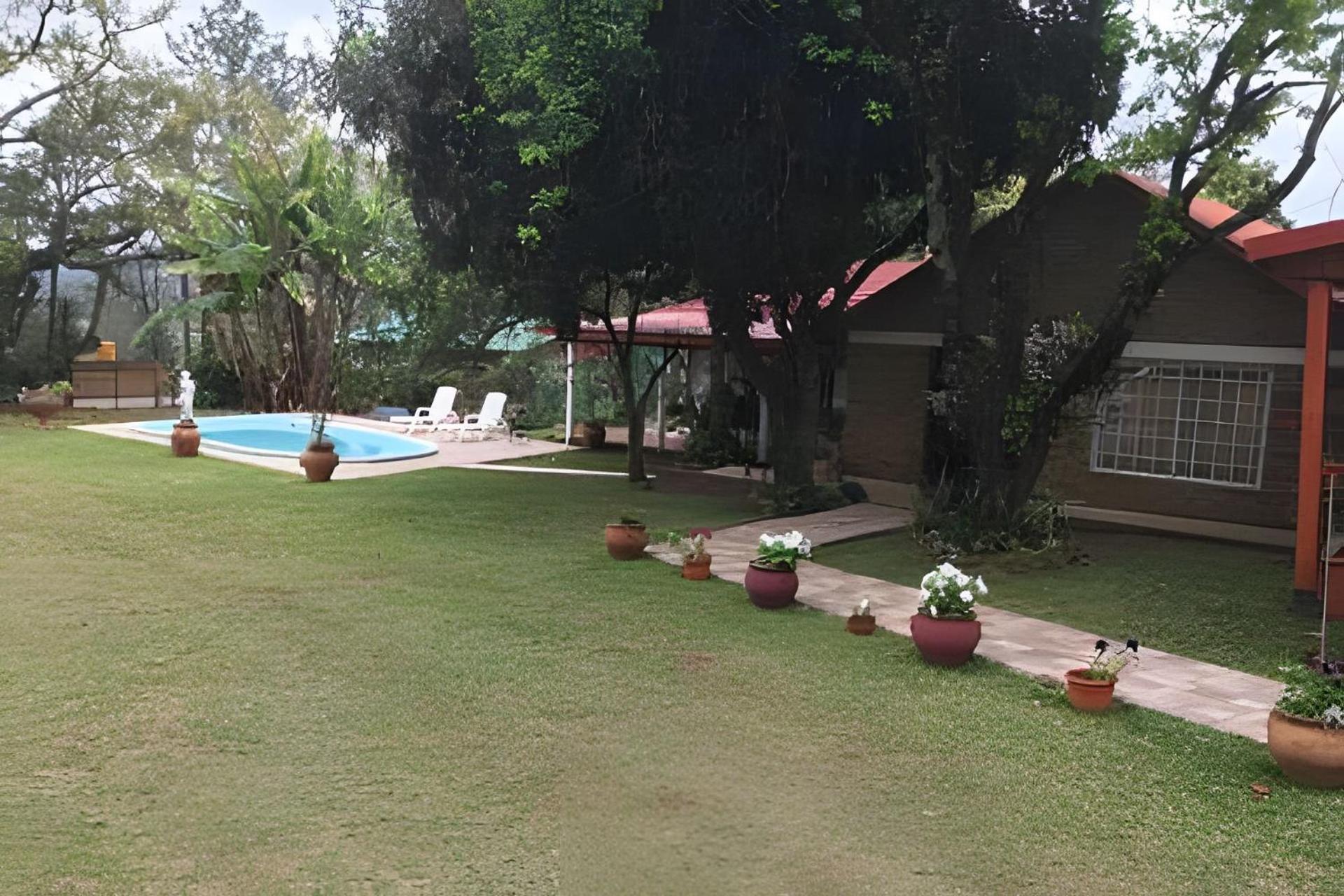 Cabañas con piscina en la entrada de Oberá