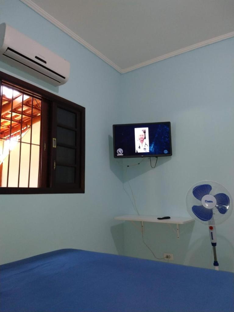 Casa Gomes com 3 suítes e ar-condicionado até 12 pessoas em Ubatuba Itaguá