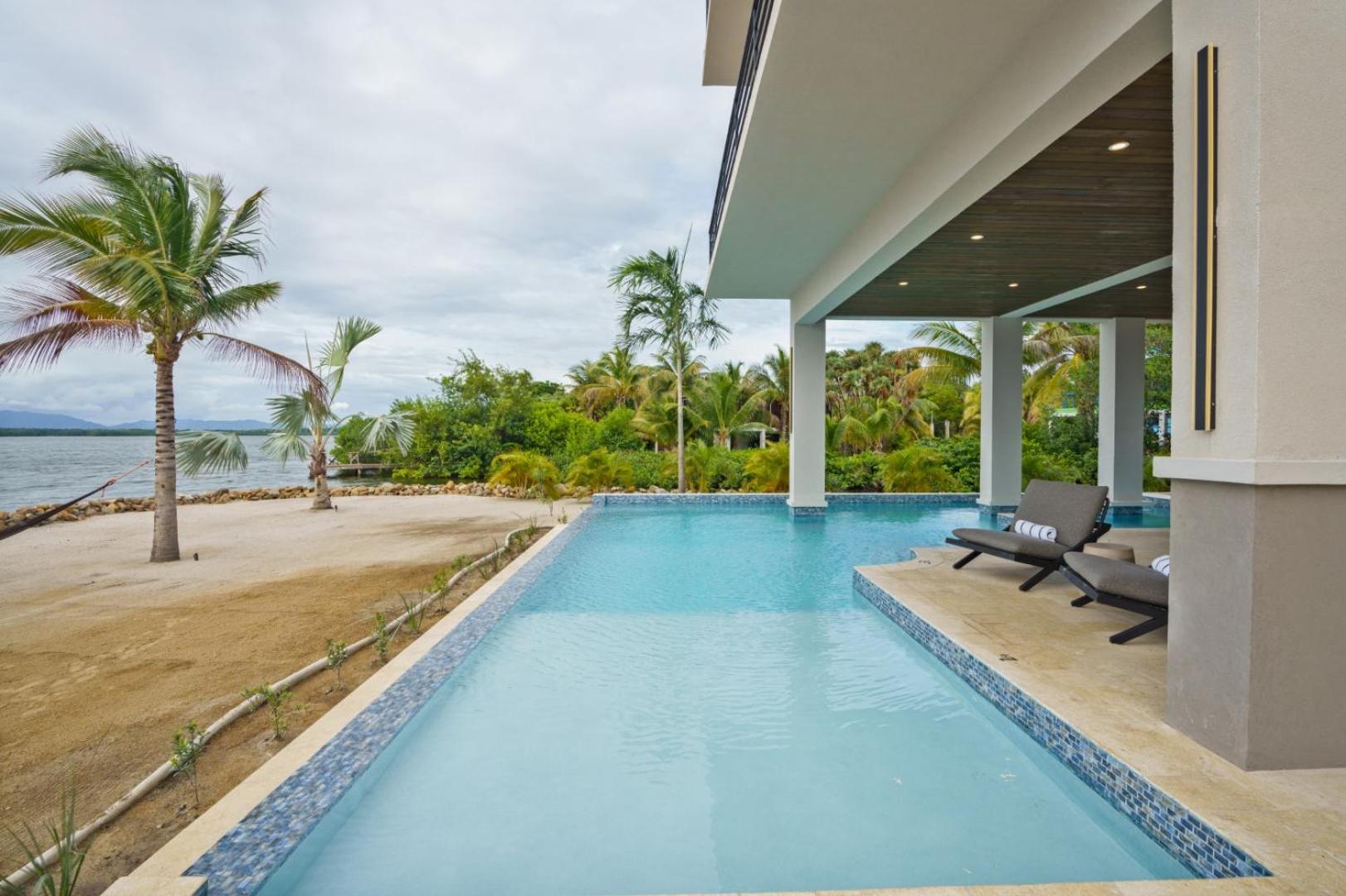 NEW 3 Story Waterfront 4Bedroom Villa with Amazing Sunset Mountain Views
