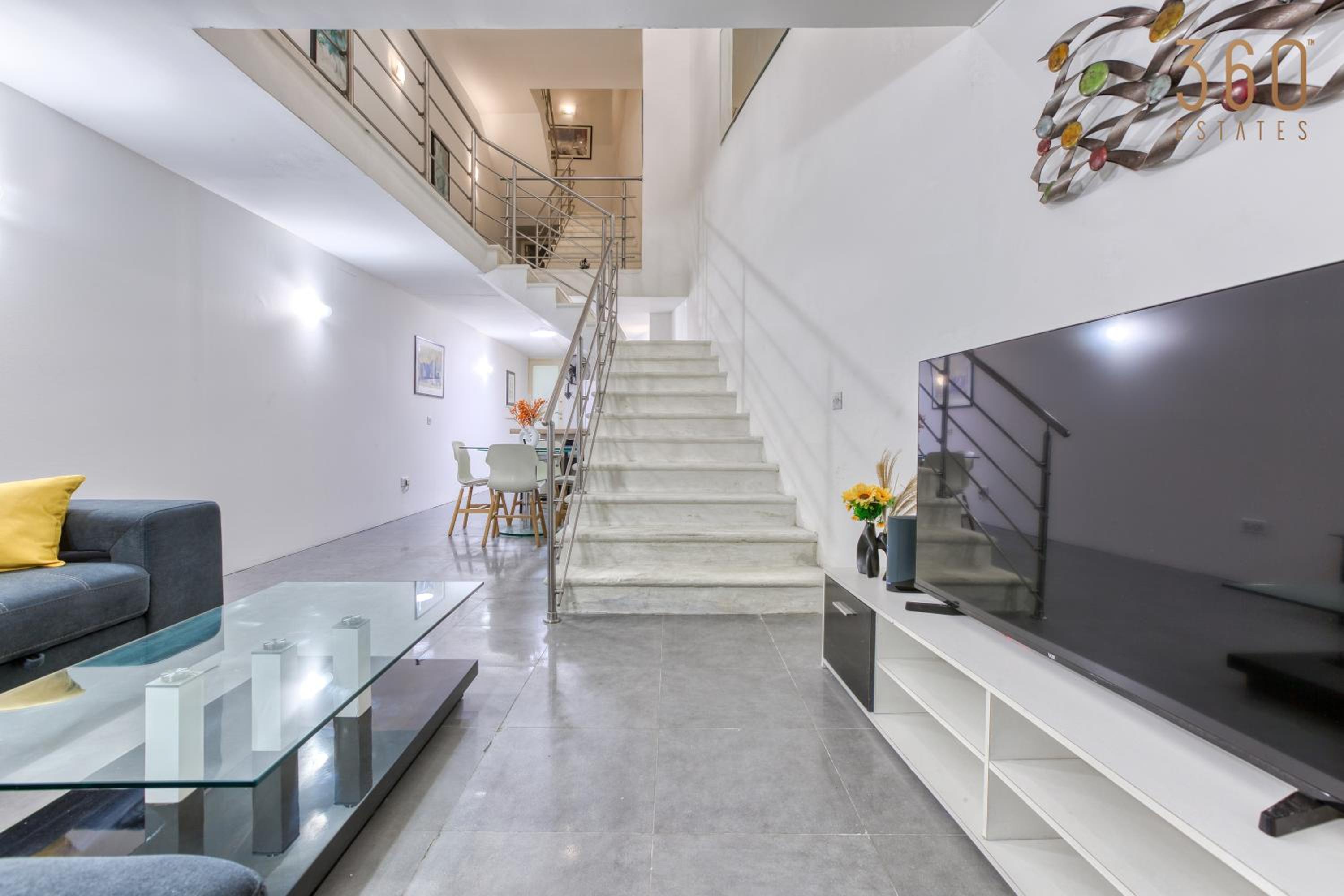 An amazing 2BR home with a special private rooftop by 360 Estates