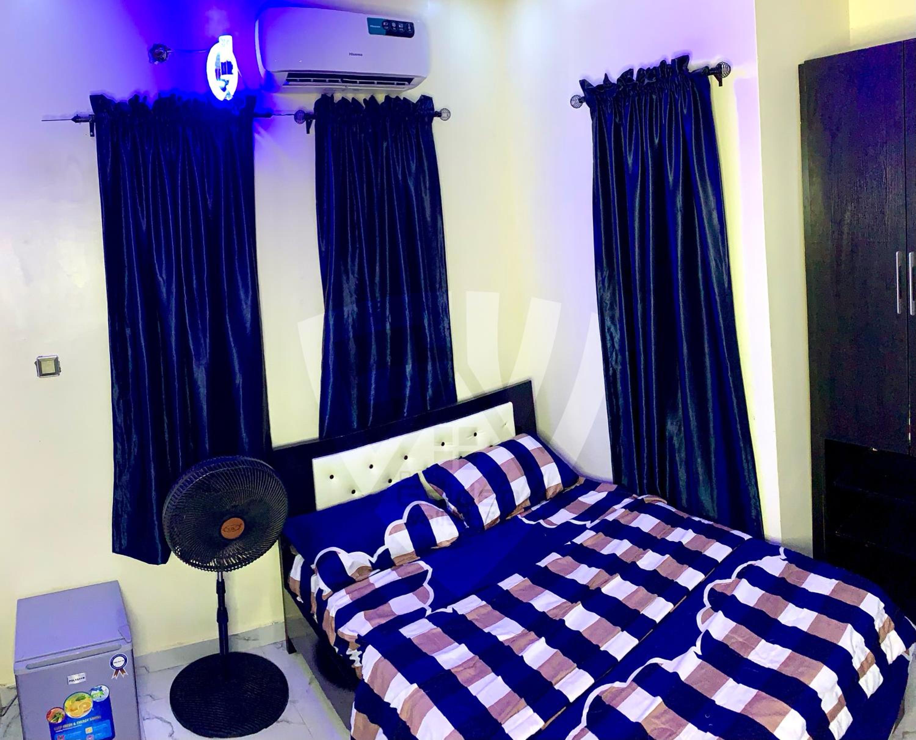 Tastefully Furnished Internet Connected Two Beds Daily Pay Apartment view 3
