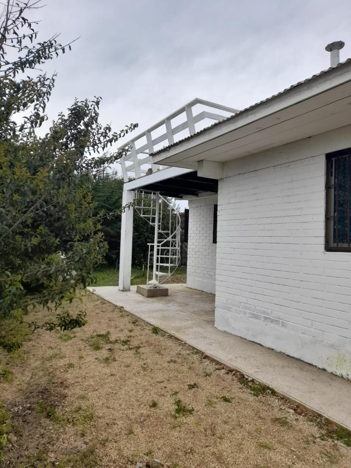 Encantadora Casa con Balcón a Pasos del Mar
