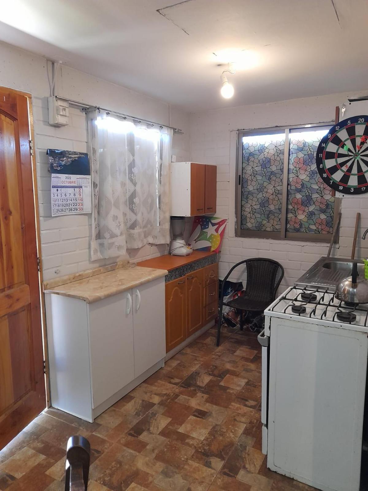 Encantadora Casa con Balcón a Pasos del Mar