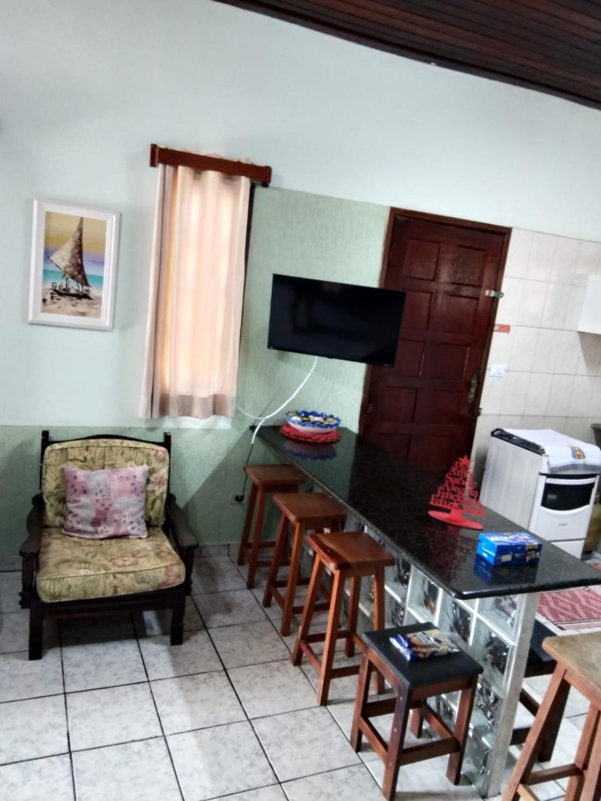 Casa próximo a praia com churrasqueira e ar condicionado!