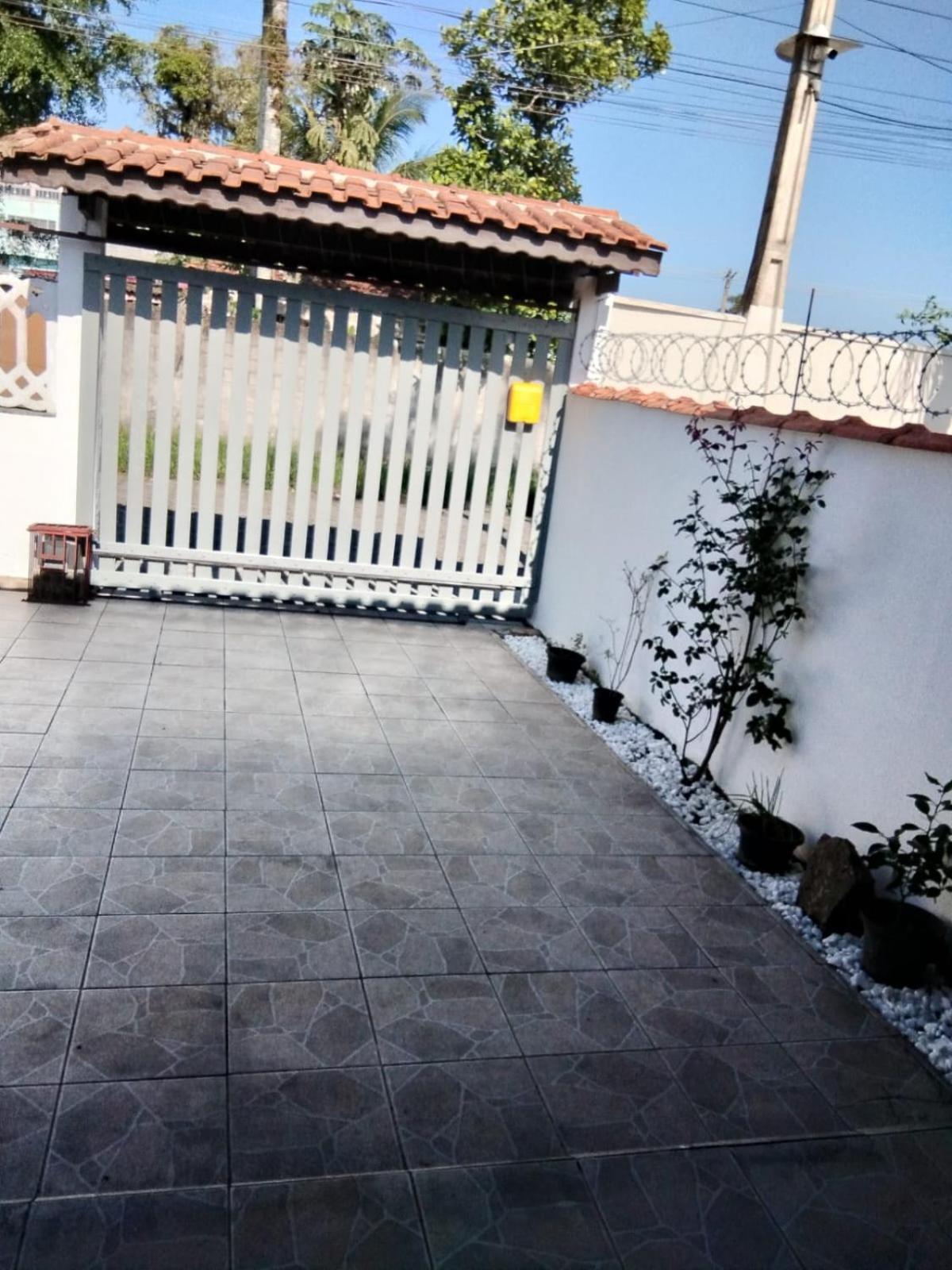 Casa próximo a praia com churrasqueira e ar condicionado!