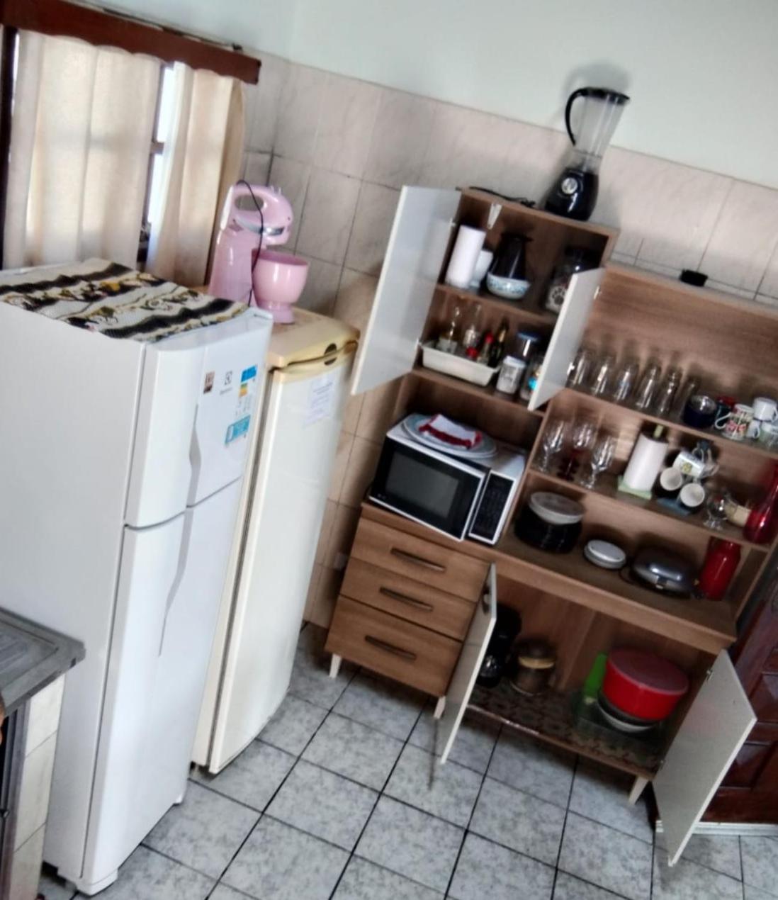 Casa próximo a praia com churrasqueira e ar condicionado!