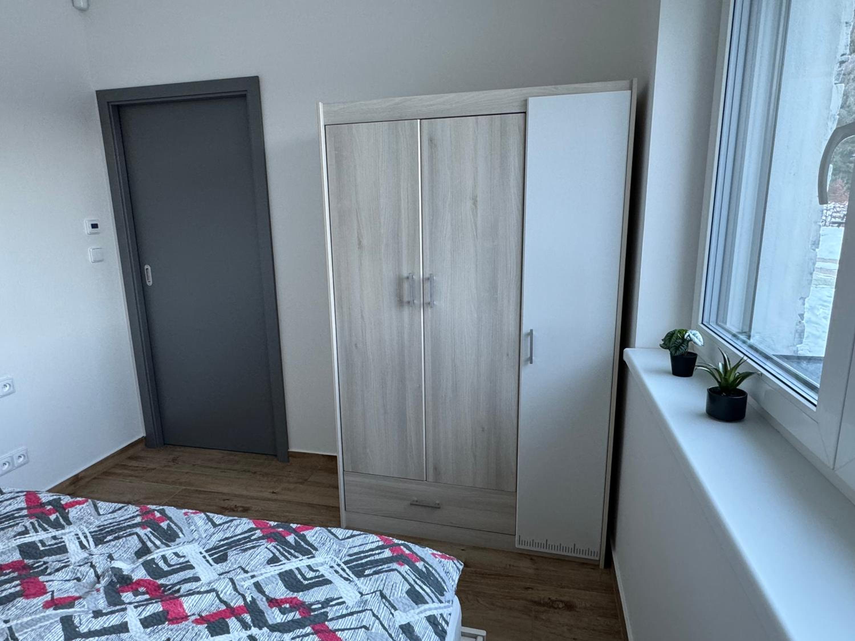 Apartmán U lesa