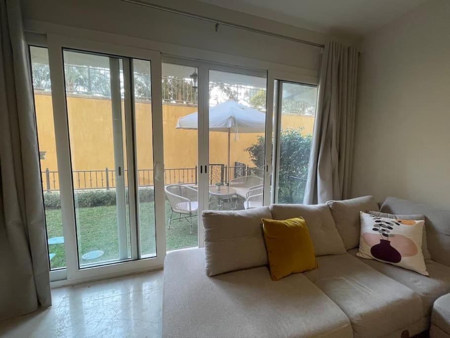 Access-Apartment with garden and shared pool