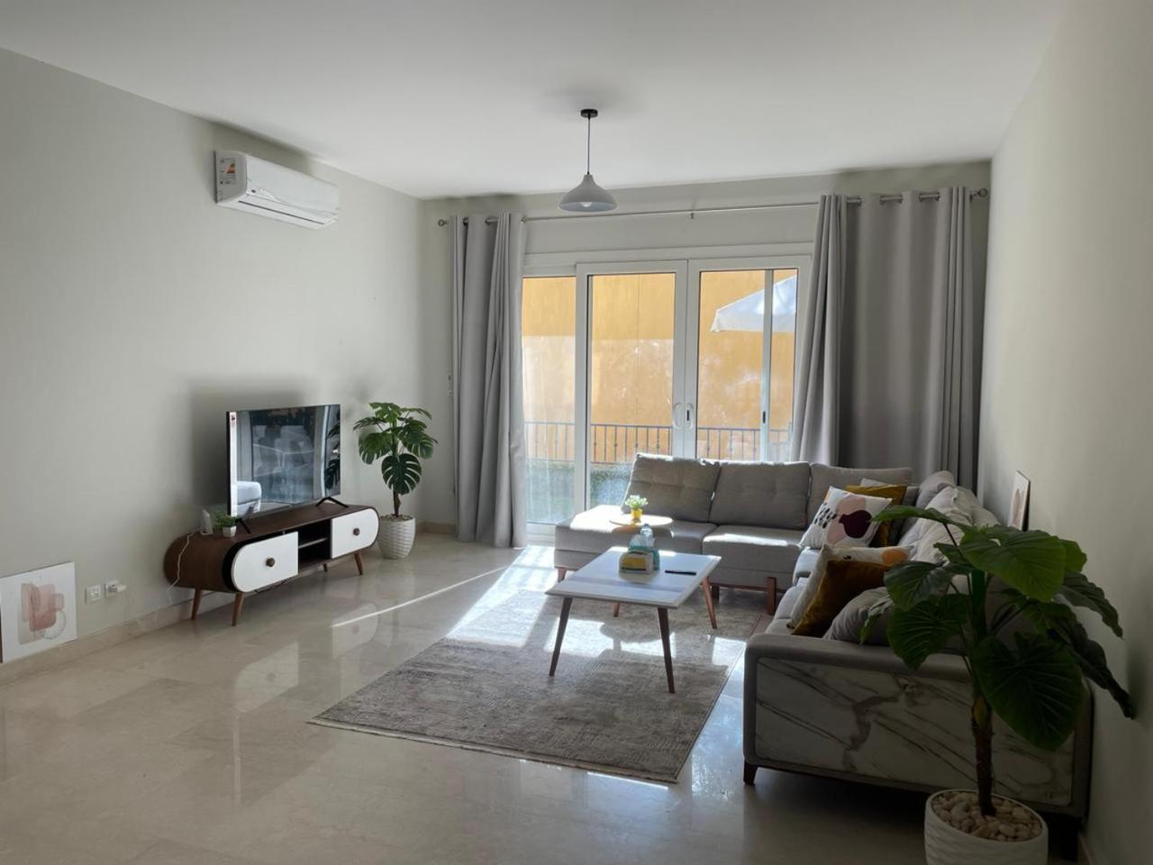 Access-Apartment with garden and shared pool