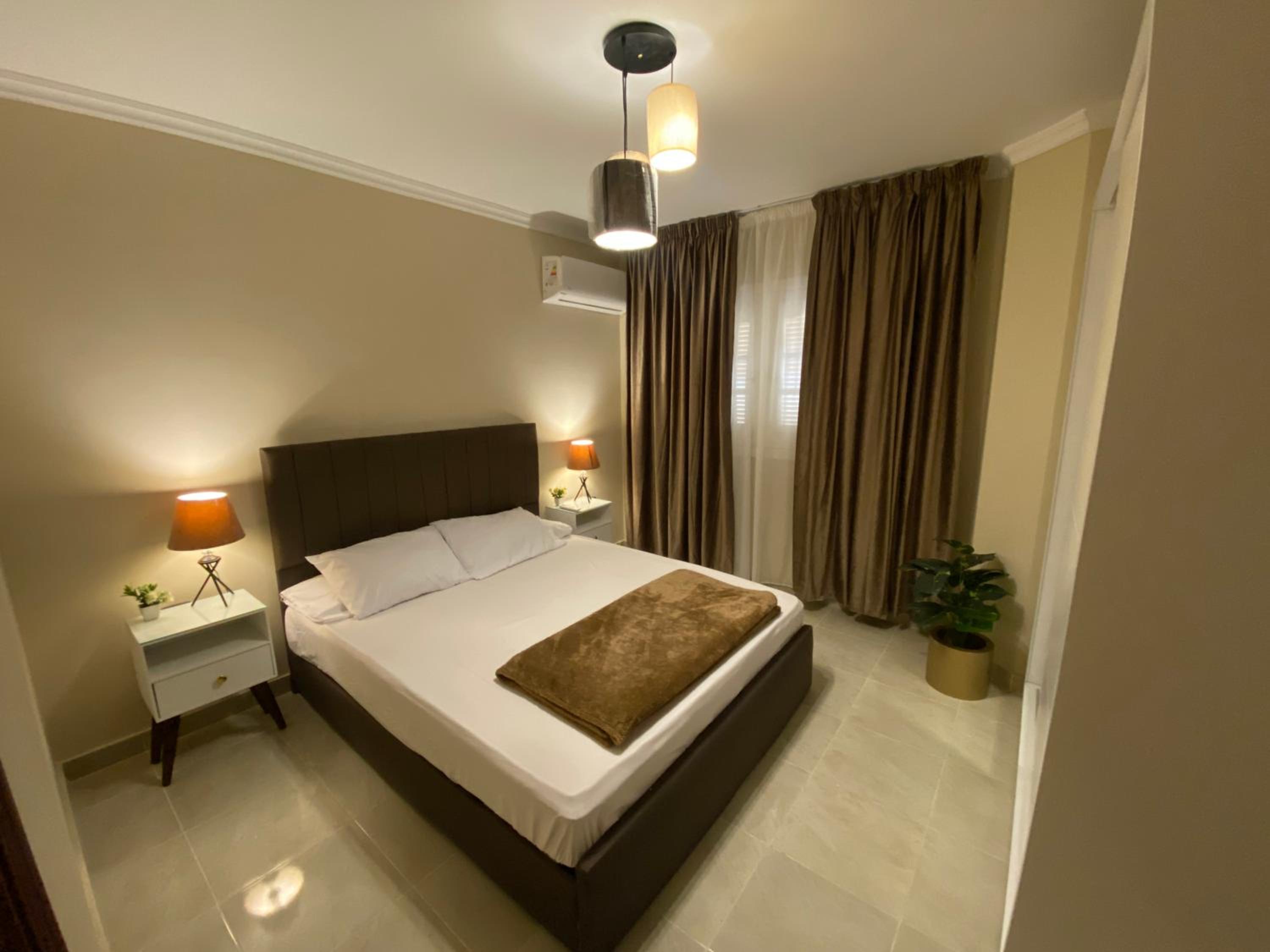 Charming 2BR with Private Garden