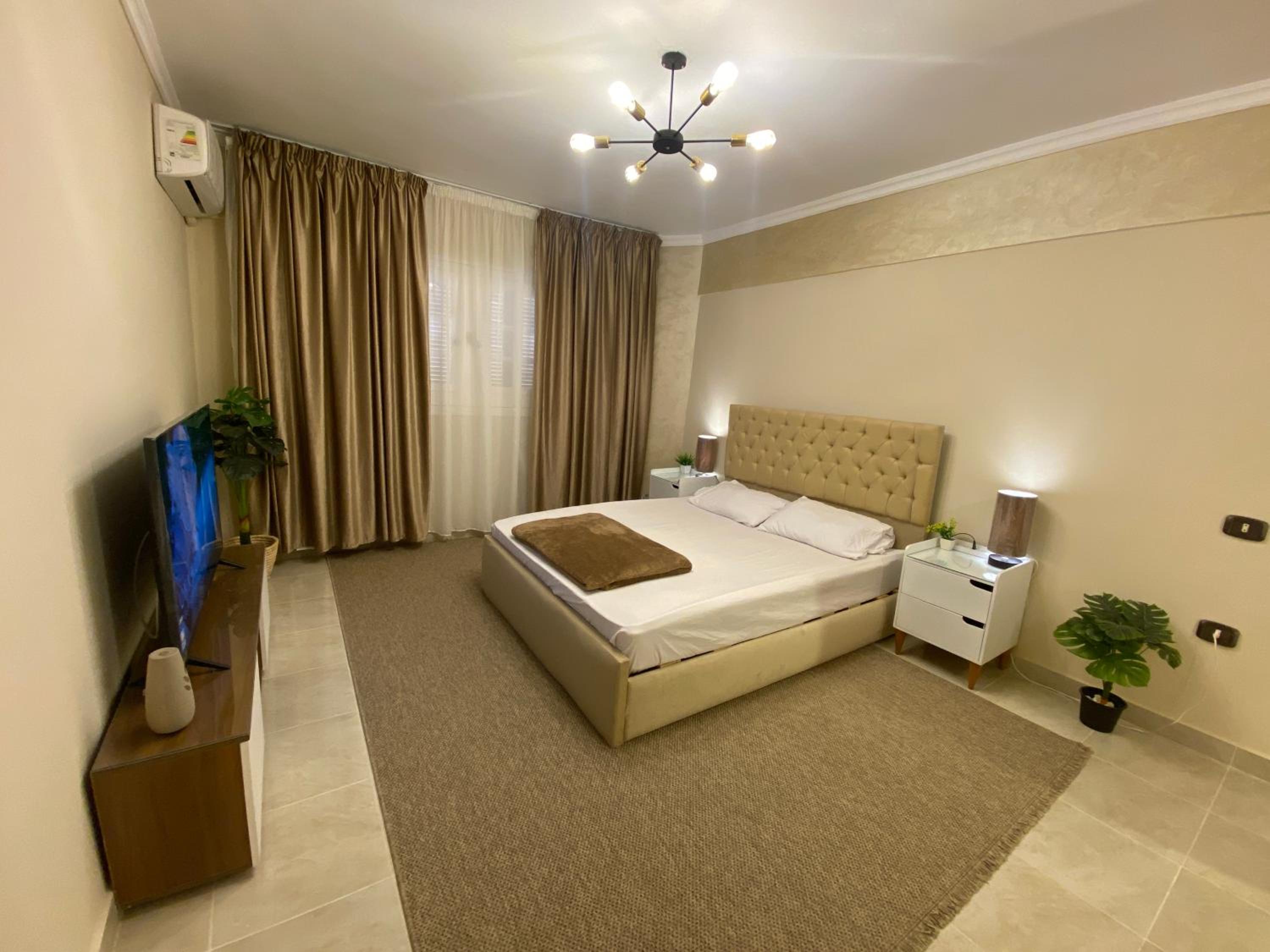 Charming 2BR with Private Garden
