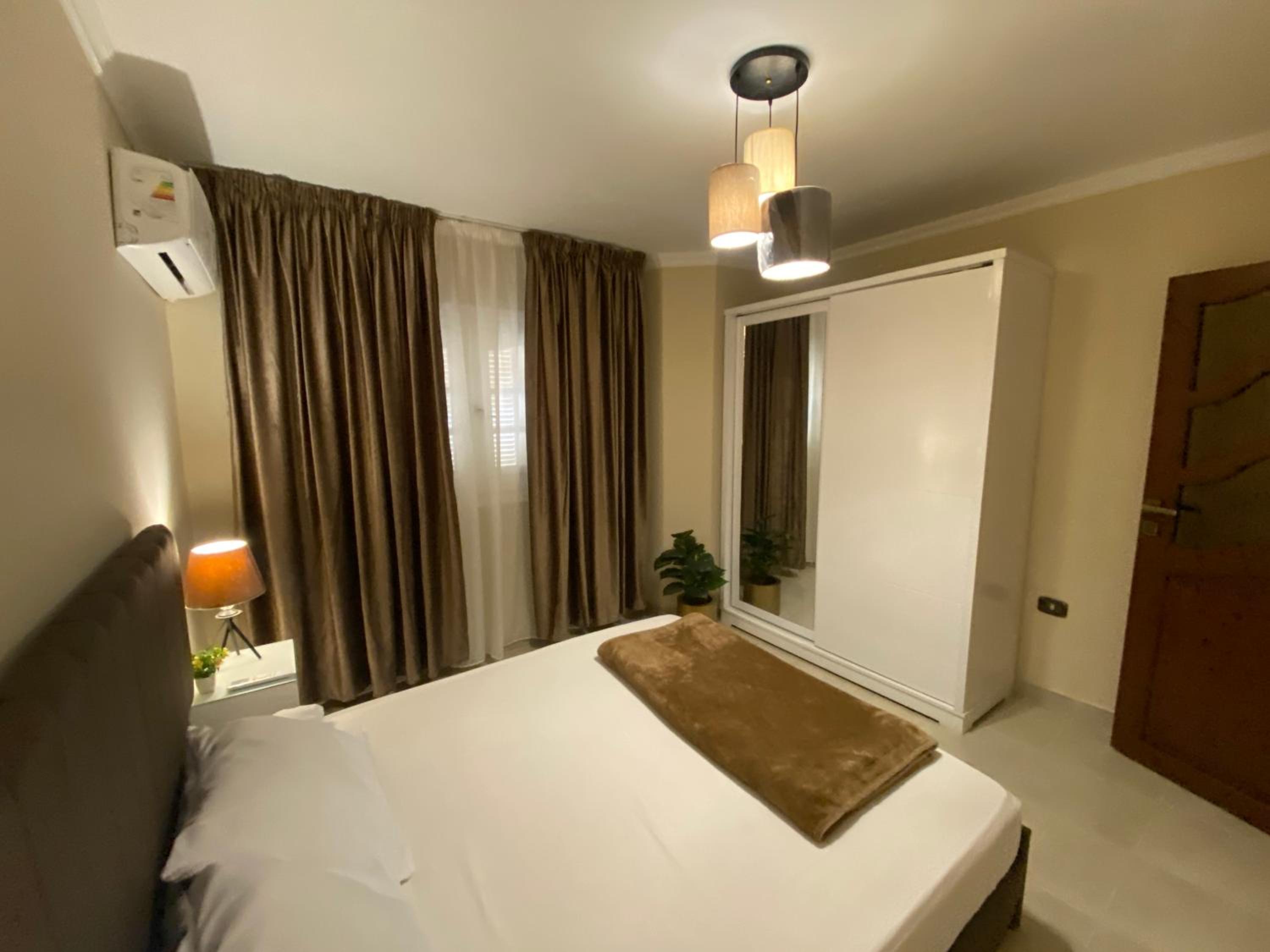 Charming 2BR with Private Garden