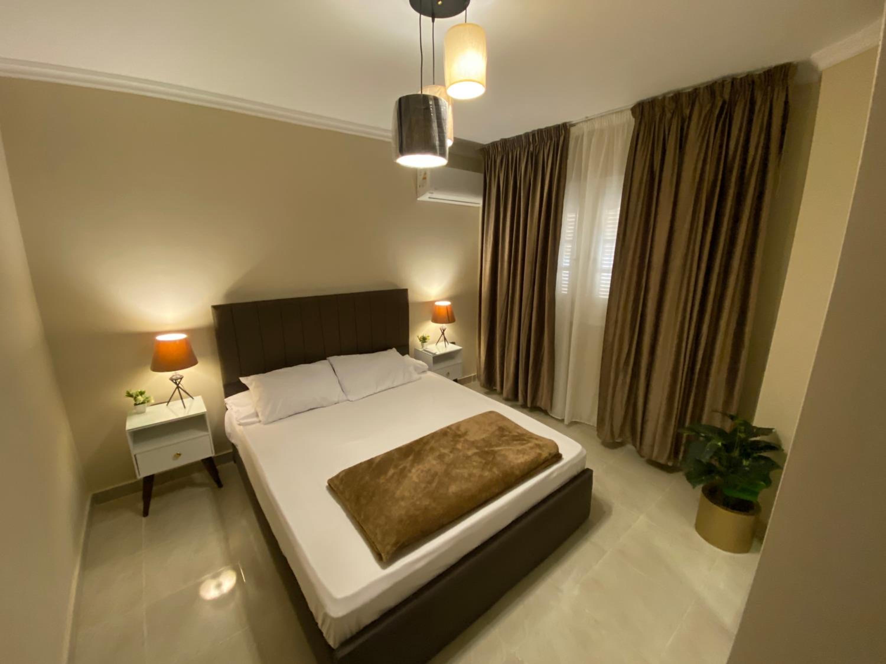 Charming 2BR with Private Garden