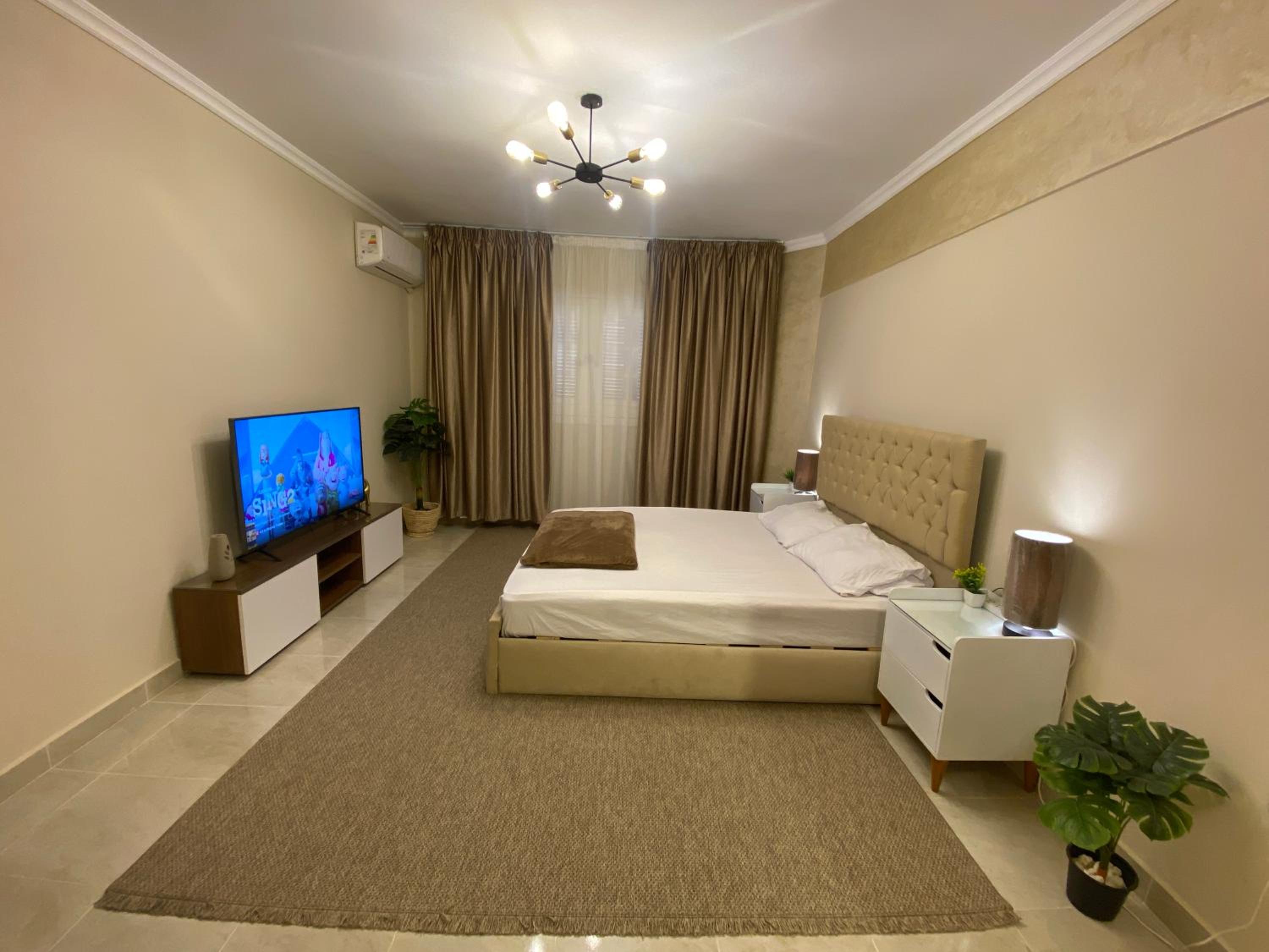 Charming 2BR with Private Garden