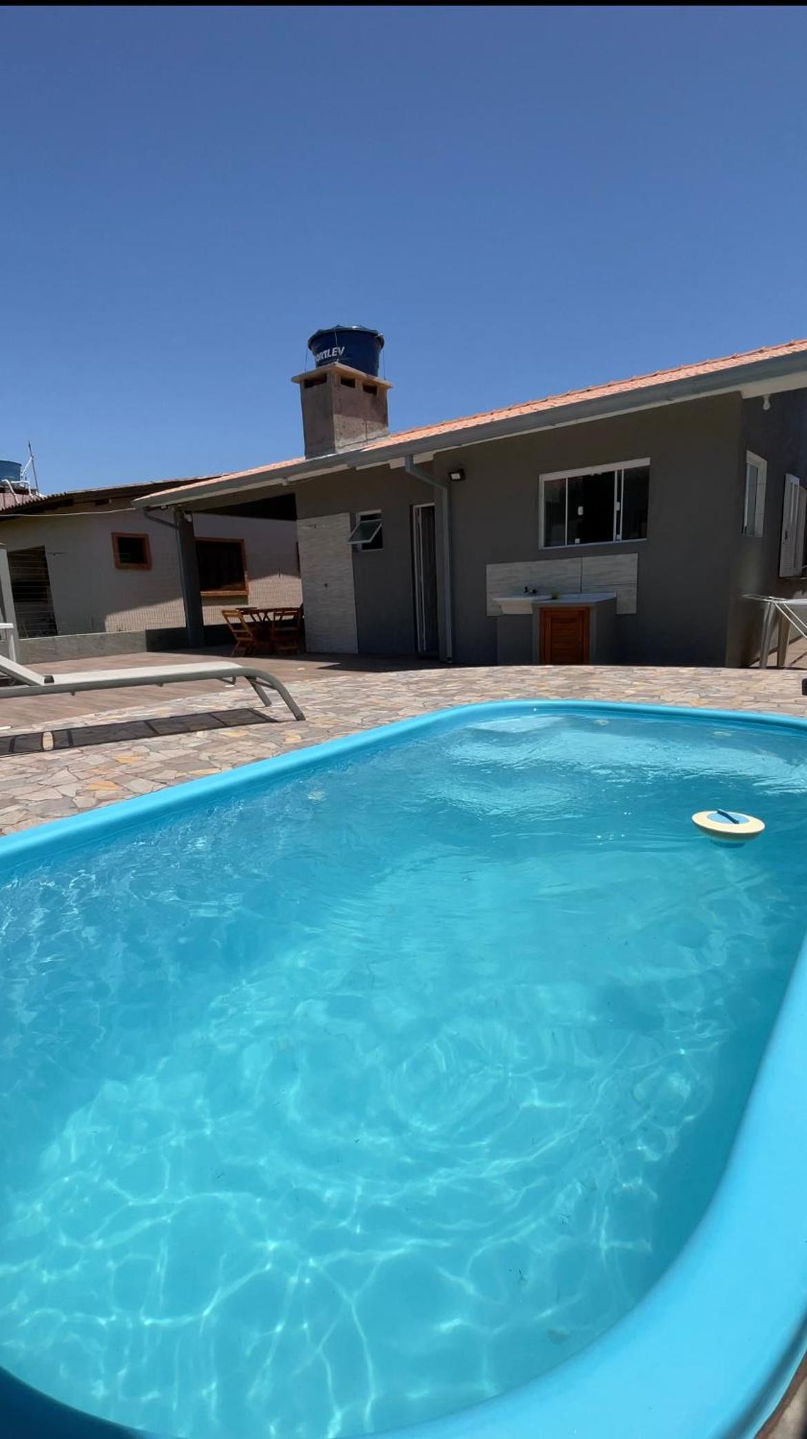 Casa com piscina Próxima ao mar