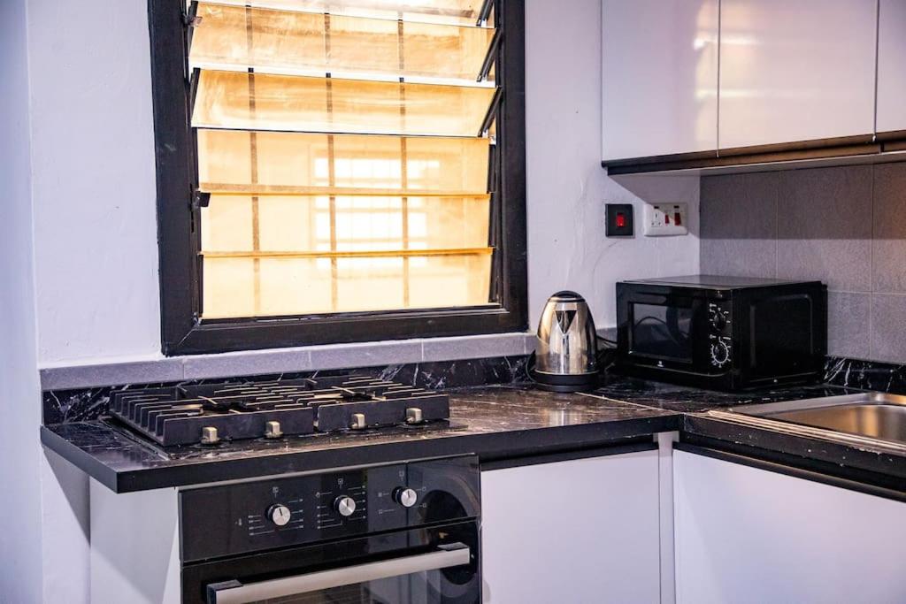 Cozy 1 Bed Apartment East Legon view 4