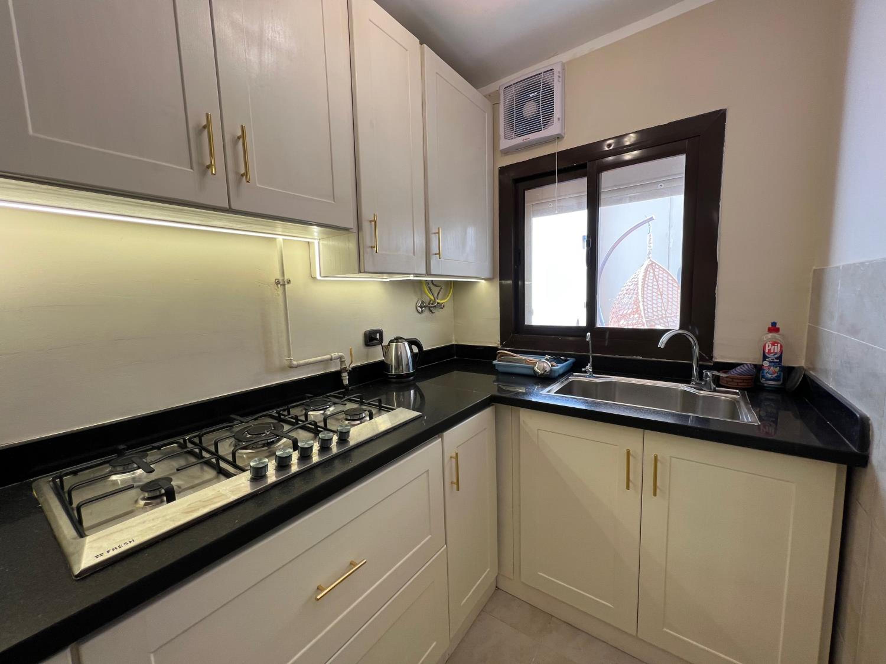 Charming 2BR with Private Garden