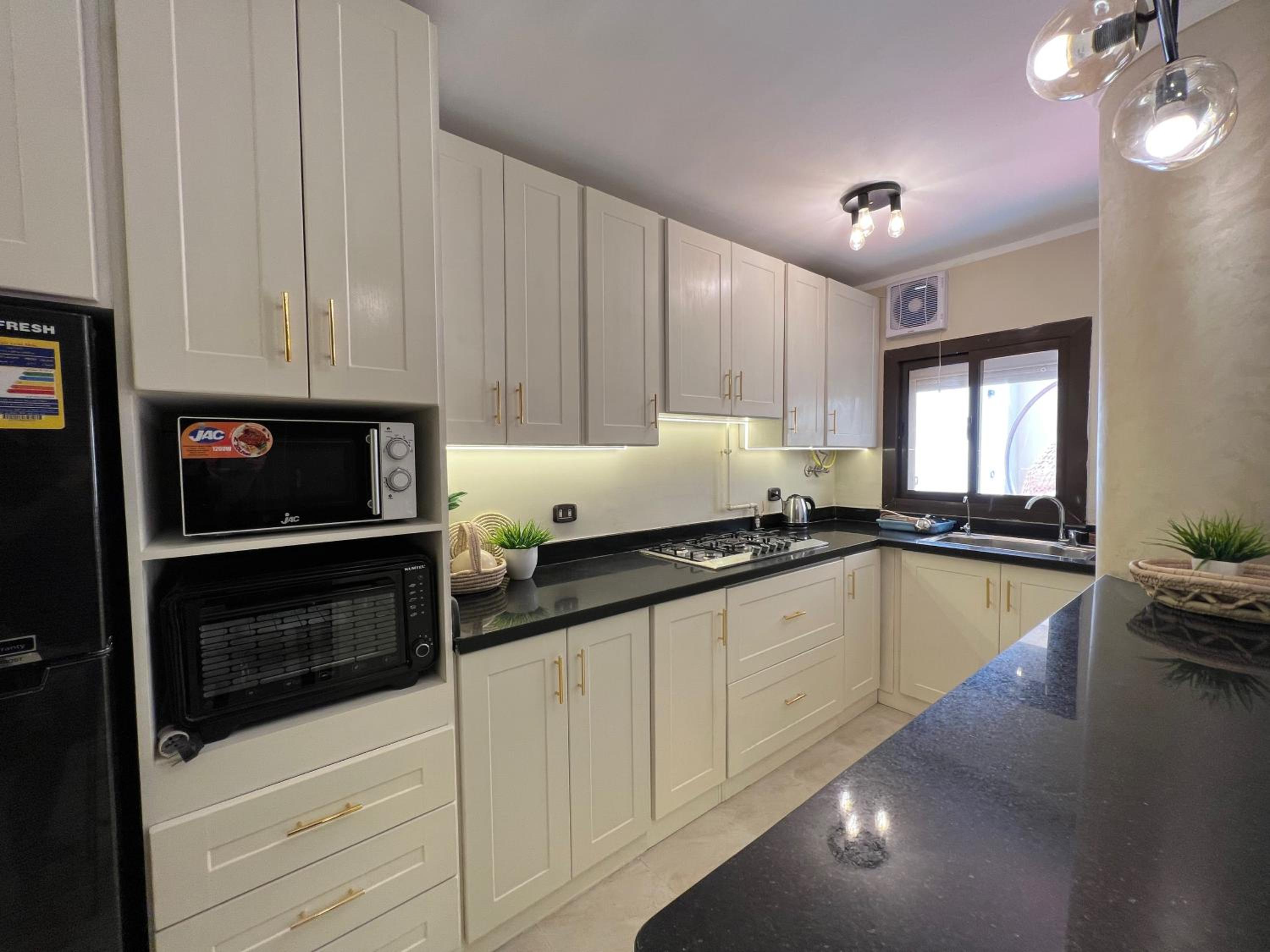 Charming 2BR with Private Garden