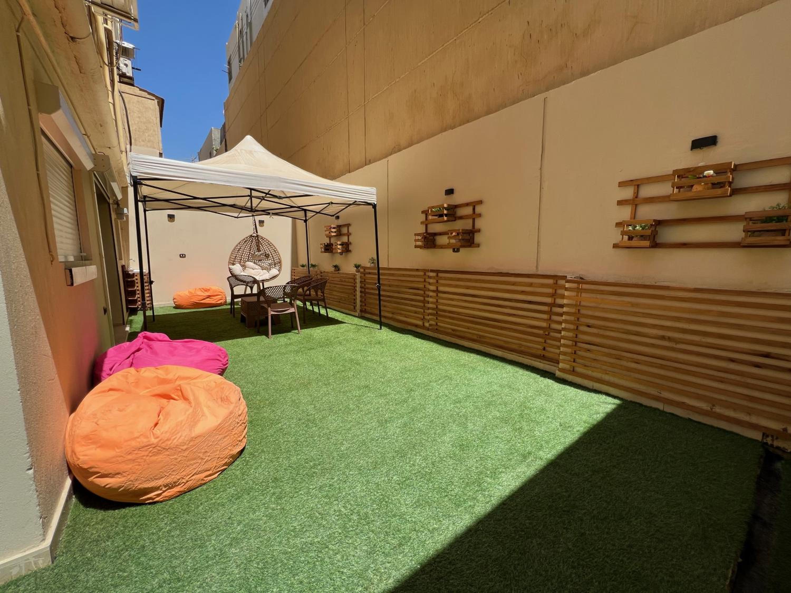 Charming 2BR with Private Garden