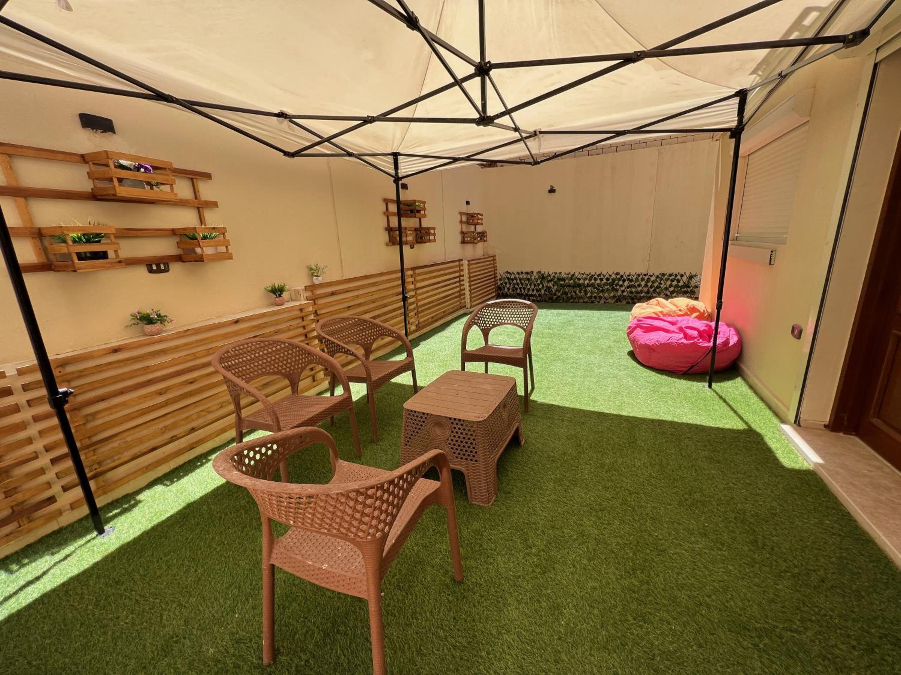 Charming 2BR with Private Garden