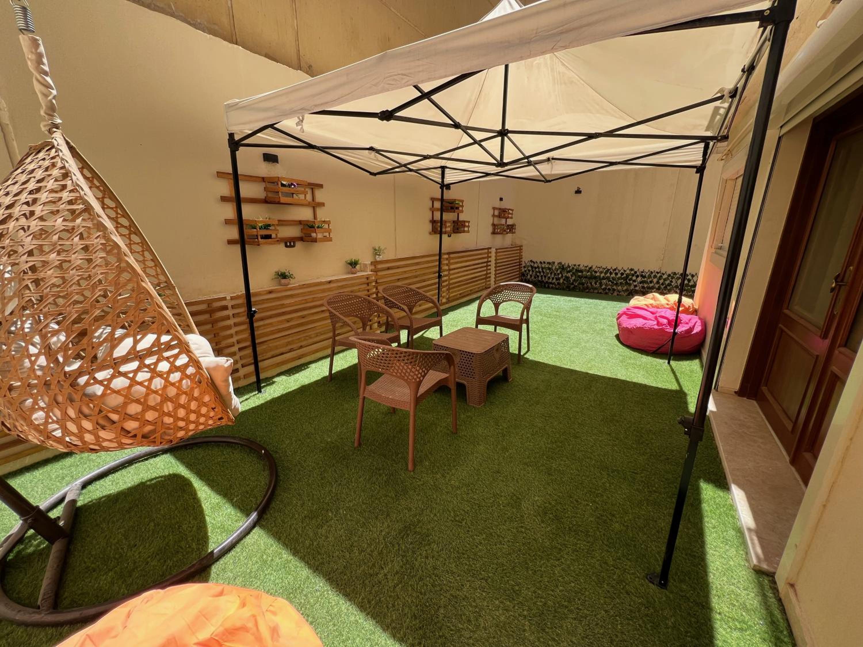Charming 2BR with Private Garden