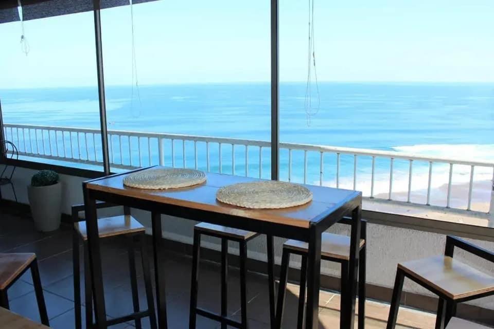 Frente a la Playa, amplio departamento para 10 personas, con 4 dormitorios y 4 baños