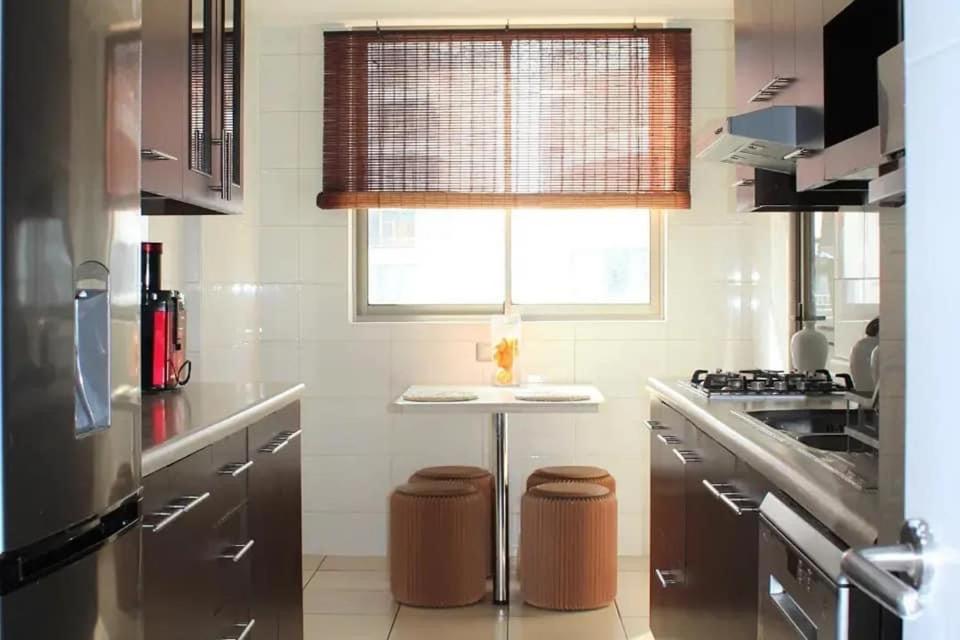 Frente a la Playa, amplio departamento para 10 personas, con 4 dormitorios y 4 baños