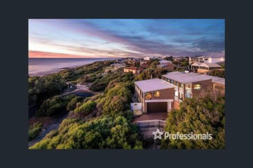 Beachfront Mansion by Peppy Beach Retreats®
