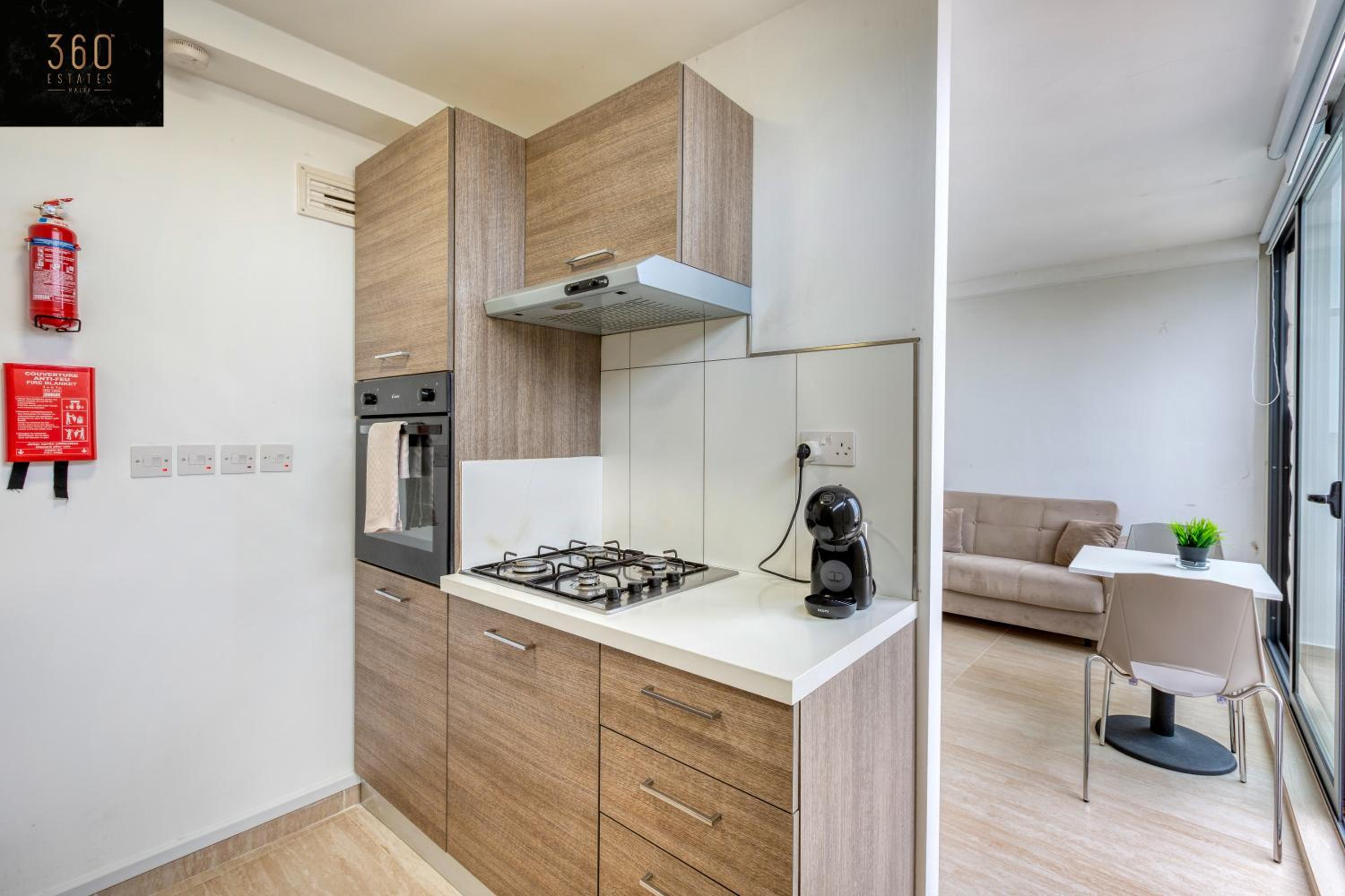 1BR penthouse with PRVT balcony in St Julians by 360 Estates photo 3