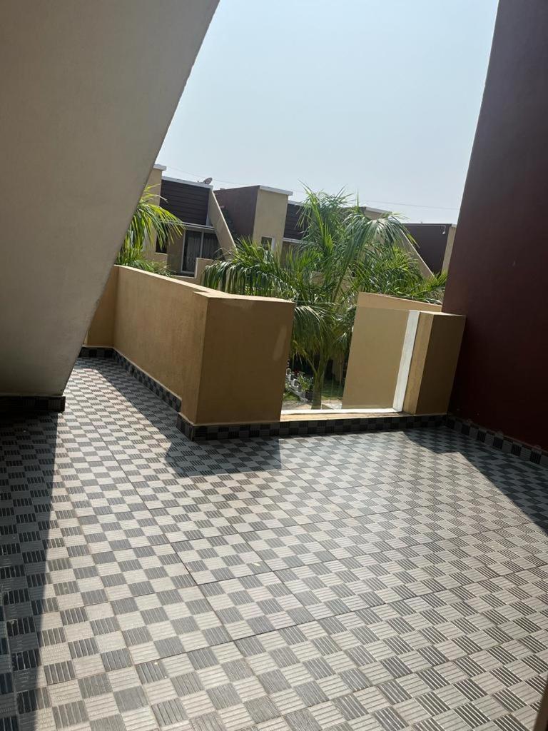 2BHK leisure home near Auroville featuring a shared community pool view 2