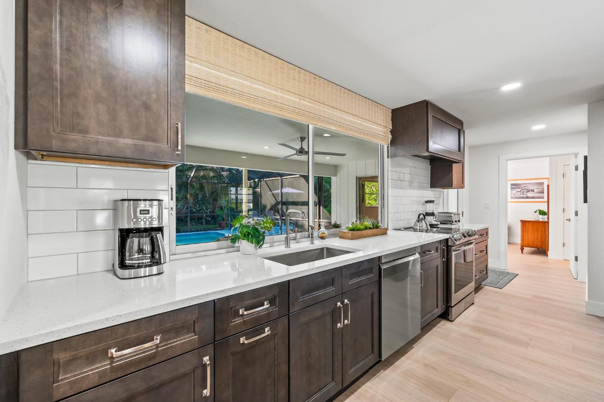 Pesaro - stylish 3BR retreat near Via Miramar Beach, beautifully renovated home with a private pool, lush tropical gardens and premium modern comforts, per view 4