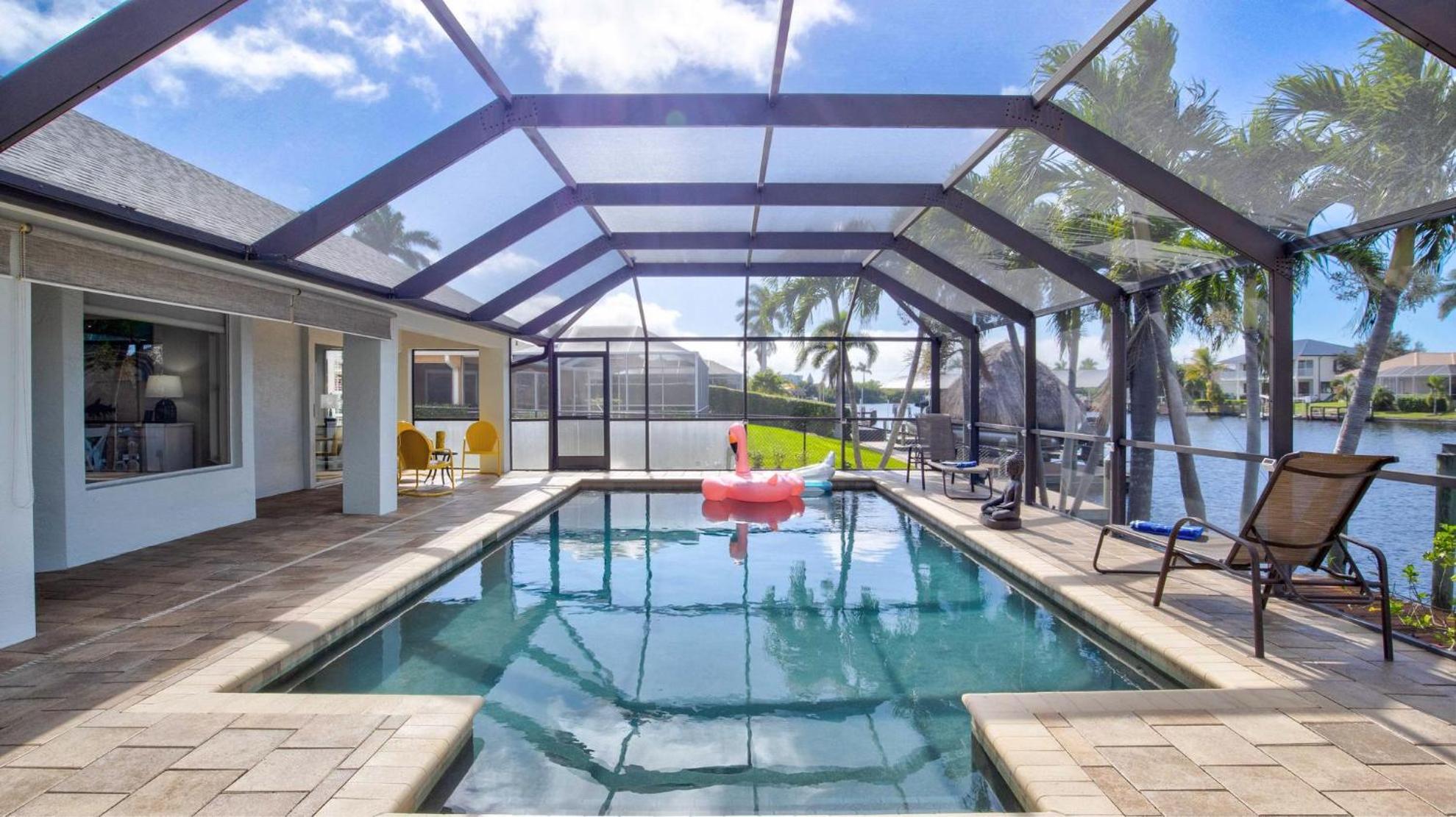 Nicely Decorated Pool Home On Canal With Boat Dock view 5