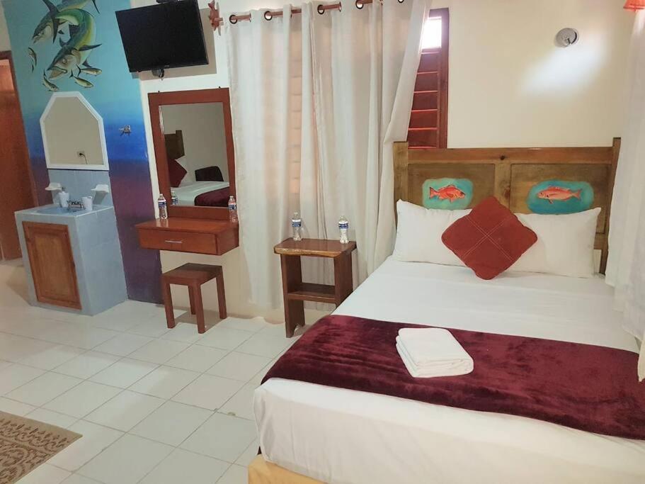 Hotel Fisherman lodge, cuarto base triple view 4