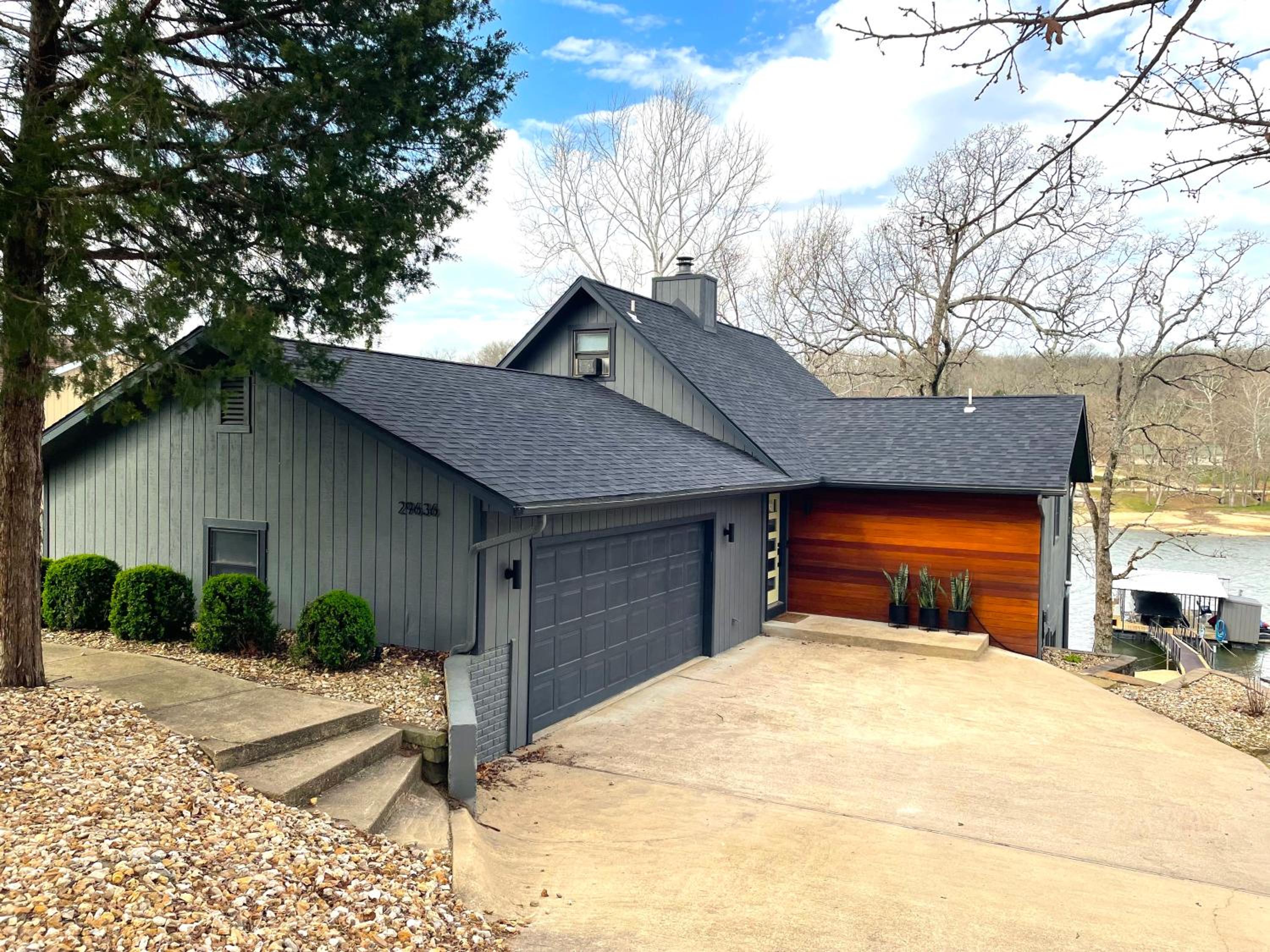 Spacious modern lake house in quite cove view 3