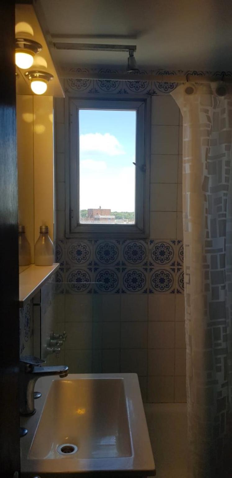 Central apartment with view to the sea -covered parking included-