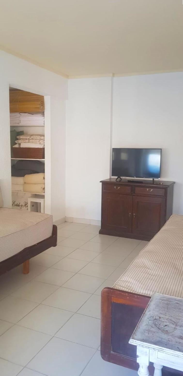 Central apartment with view to the sea -covered parking included-