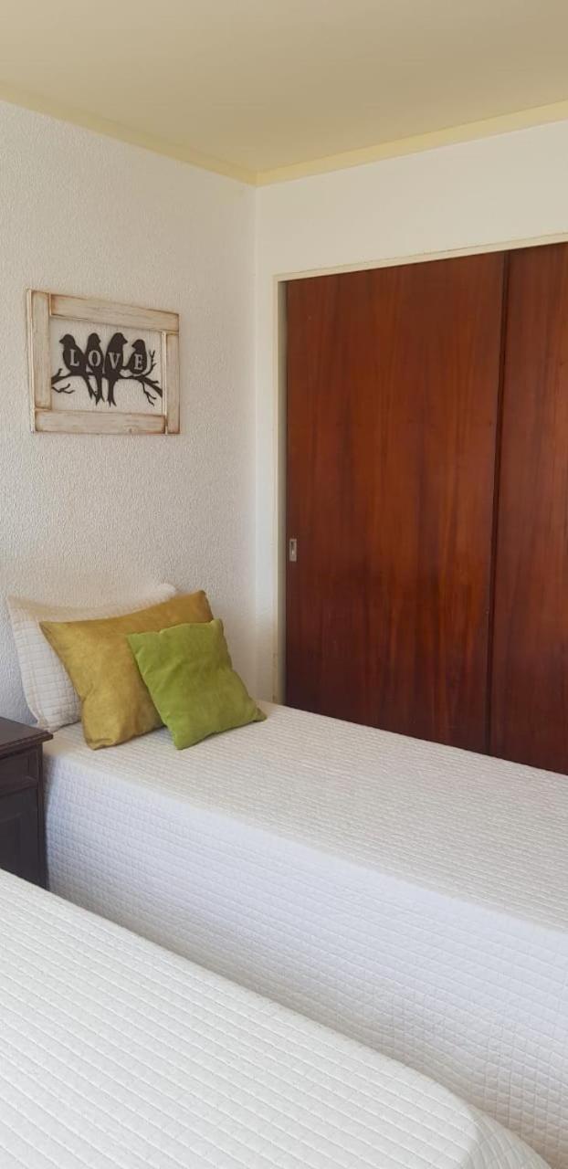 Central apartment with view to the sea -covered parking included-