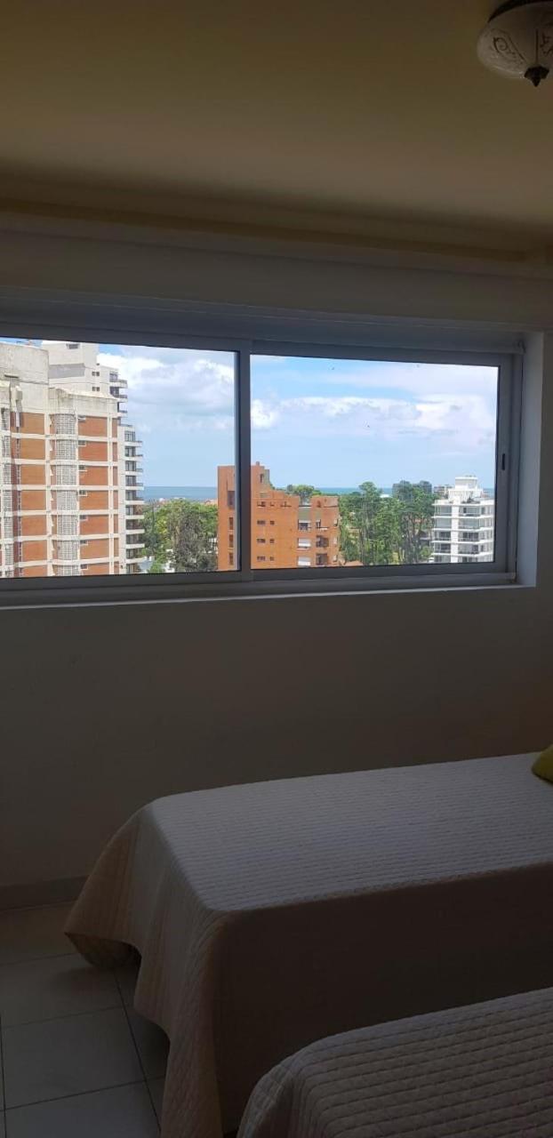 Central apartment with view to the sea -covered parking included-