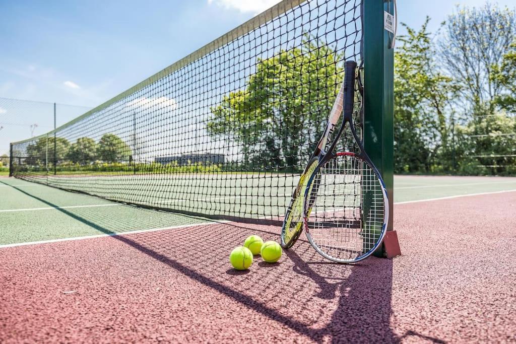 Spacious 4 bed home with gym and tennis court view 4