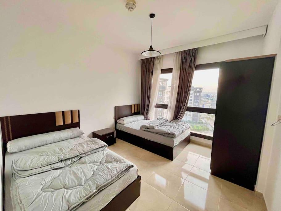 UNIQue 2BRs LOCation l DOWNTown NEWCairo/City view