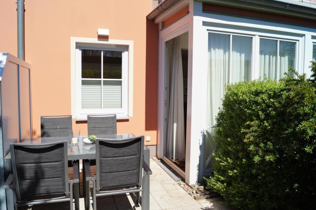 Großzügige Whg. mit verglaster Veranda, geschützter Terrasse