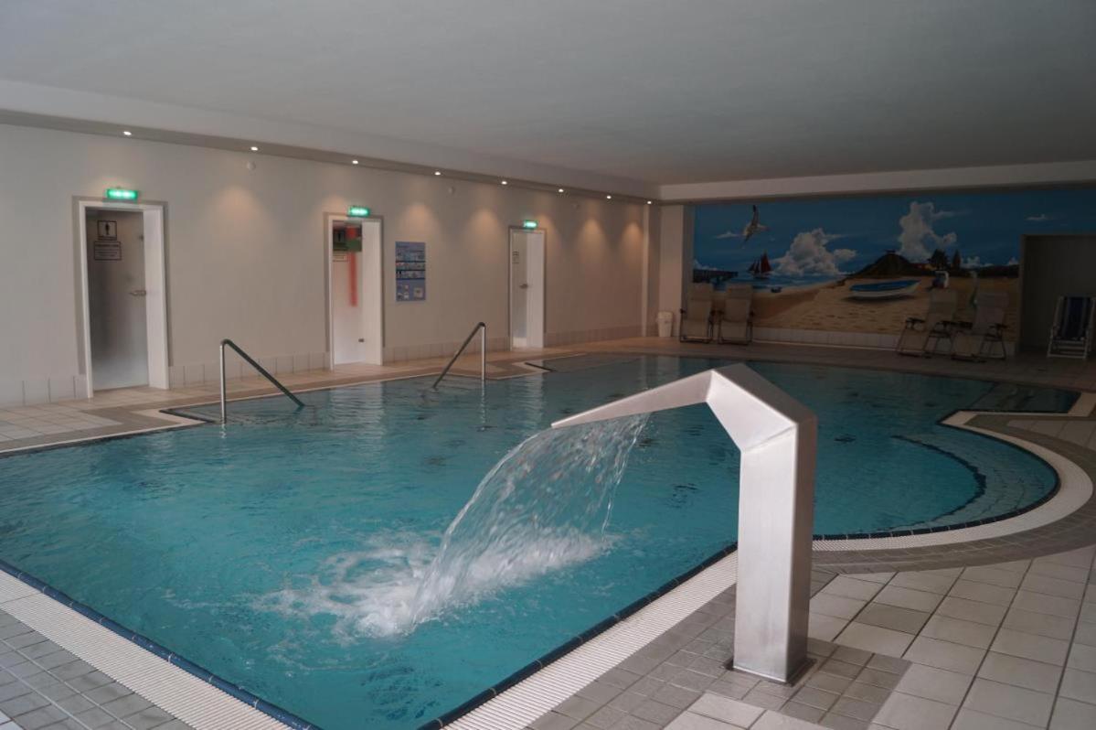 Ferienapartment mit Balkon, Tiefgarage und Nutzung v. Wellnessbereich