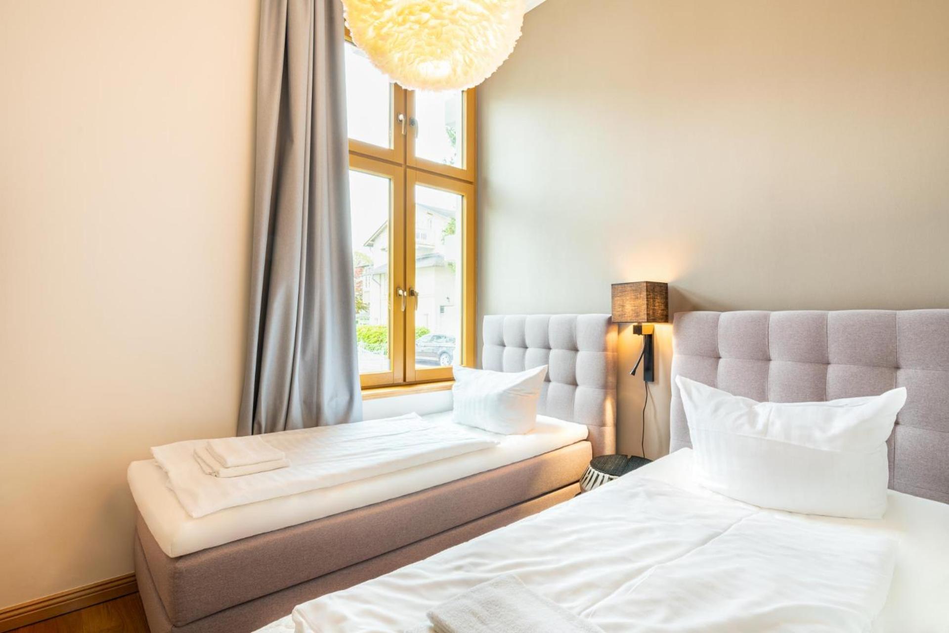 Designerwohnung in alter Villa für Familien, mit Terrasse und 2 Schlafzimmern