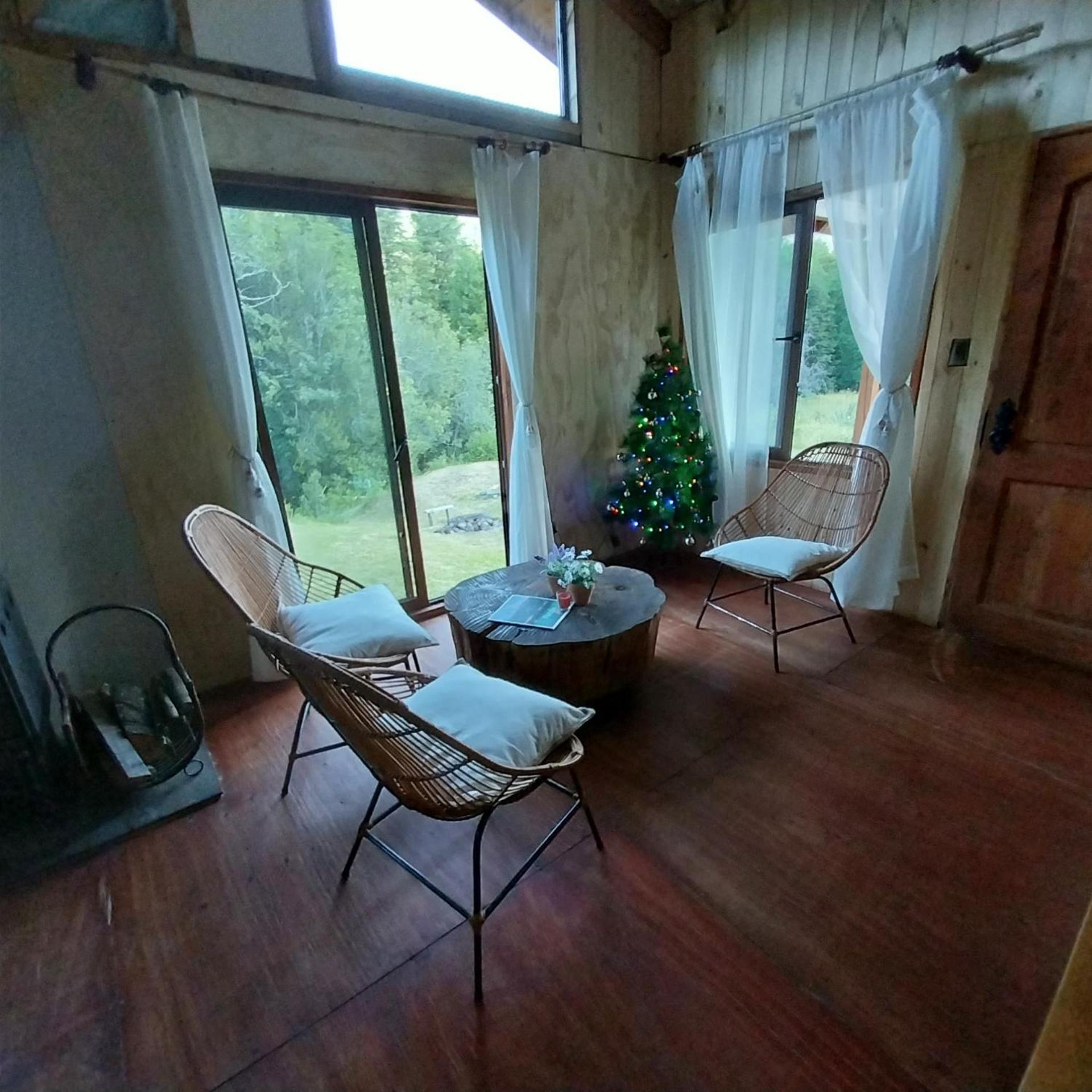 Cabaña a orilla del río Liucura