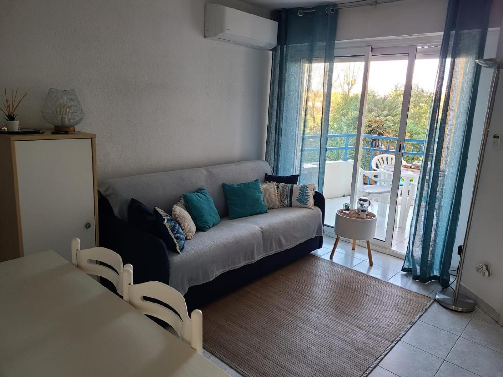 T2 climatisé à 5 minutes à pied de la plage avec parking, piscine et wifi
