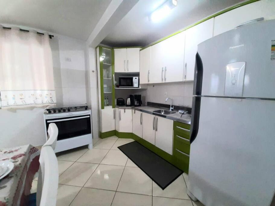 Casa nova no Booking, no coração da Meia Praia.